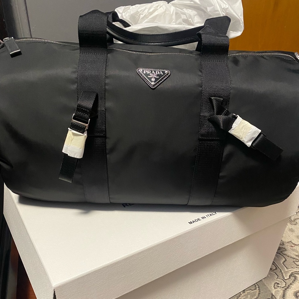 Brand new with tags and Original Box.  Prada x Adidas travel duffel bag